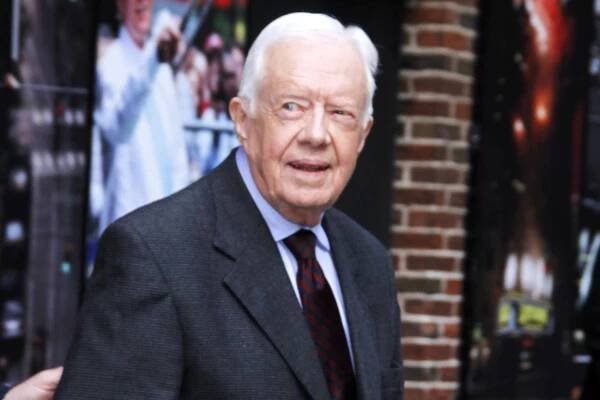 Jimmy Carter leaves the "Late Show with David Letterman" at Ed Sullivan Theater on March 24, 2014 in New York City.