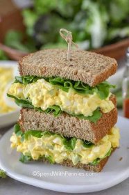 This simple homemade egg salad recipe is great for egg salad sandwiches and as an easy lunch recipe! For a low-carb option, wrap egg salad in fresh, crisp lettuce or a low-carb wrap. With easy ingredients and only 20 minutes, egg salad is ready in no time! #eggsalad #eggsaladsandwich #homemadeeggsalad #spendwithpennies 