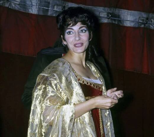 FILE - Maria Callas appears after the final curtain of the gala performance of Tosca at the Royal Covent Garden Opera House, London, on Monday, July 5, 1965. (AP Photo/Robert Dear, File)