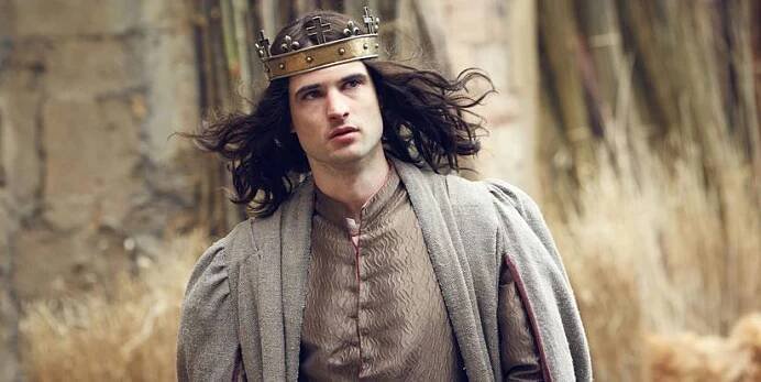 a king is walking in the wood