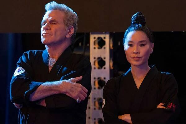 Cobra Kai. (L to R) Martin Kove as John Kreese, Alicia Hannah-Kim as Kim Da-Eun in Cobra Kai.