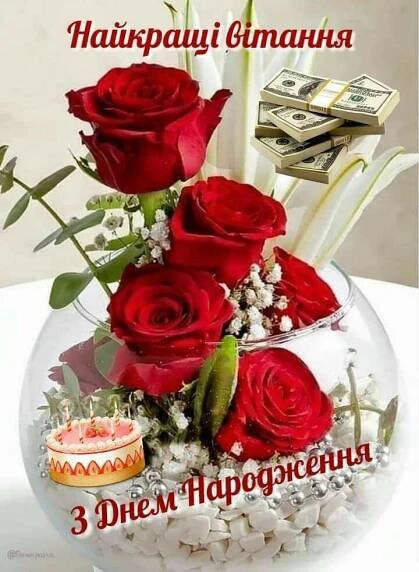 a vase filled with red roses sitting on top of a table