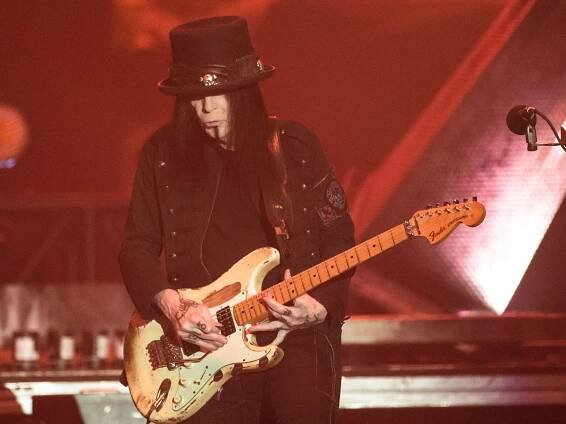Mick Mars performing live