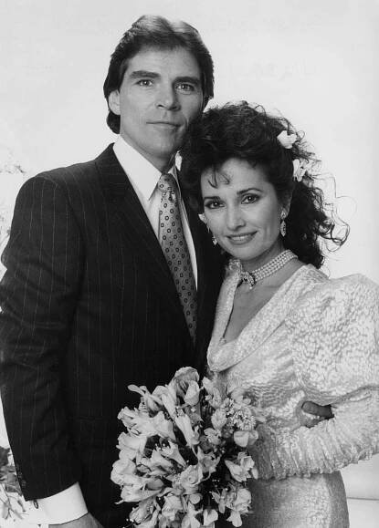 Larkin Malloy and Susan Lucci posing as Travis Montgomery and Erica Kane for a wedding portrait for 'All My Children' in 1988