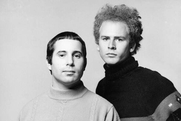 NEW YORK - CIRCA 1967: Singer/songwriter Paul Simon (left) and singer Art Garfunkel of the folk rock duo Simon & Garfunkel in a Columbia Records publicity still circa 1967 1966 in New York, New York. (Photo by Columbia Records/Michael Ochs Archives/Getty Images)