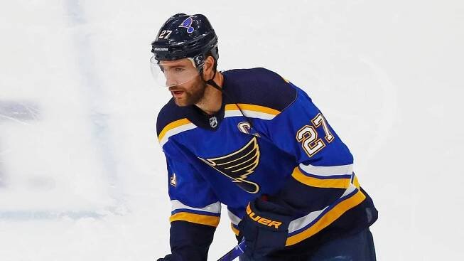 Professional Hockey Player Alex Pietrangelo in Cool Blue Jersey Wallpaper