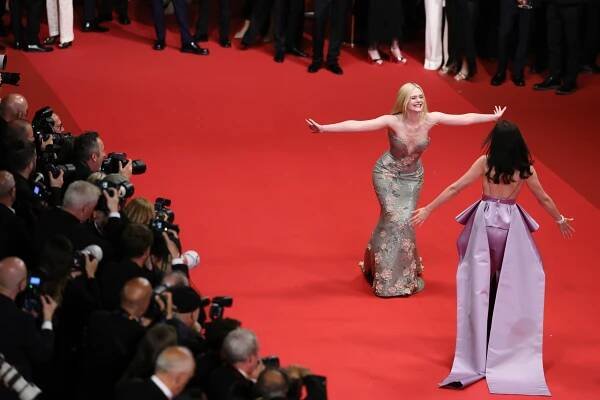Fanning and Renate Reinsve on the 'Sentimental Value' red carpet
