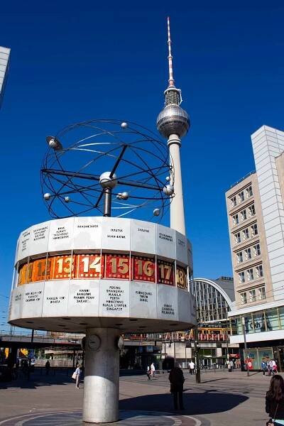 image of world clock (welt uhr) and tv tower in alexanderplatz berlin germany