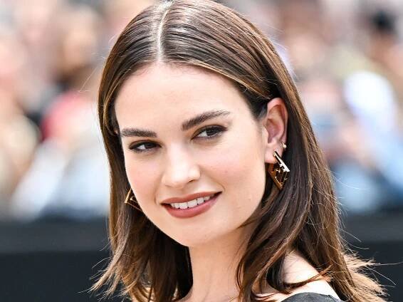 Lily James Matched Her Manicure to Her Cozy Gray Sweater — See Photos