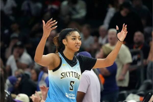 Chicago Sky forward Angel Reese walks to the bench during the second half of a WNBA basketball game