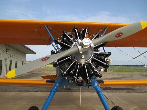 A plane with a propeller on the front of it