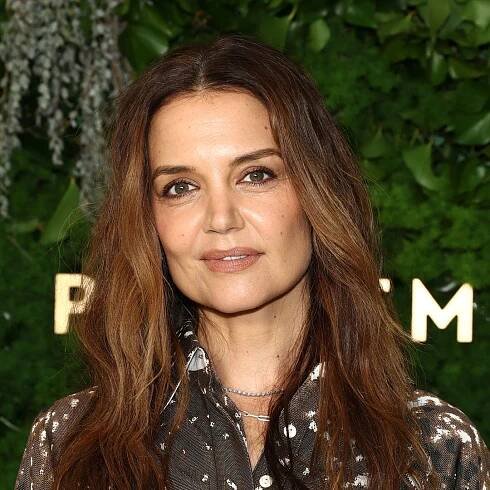Katie Holmes steals the show with slick hair updo and semi-sheer top during NYC outing