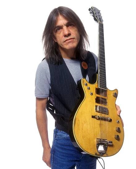 Malcolm Young, Whose Guitar Riffs Helped Propel AC/DC to Fame, Dies at 64