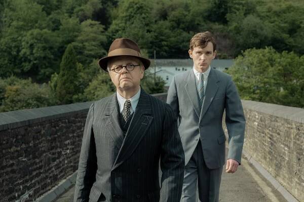 Film still of Toby Jones and Harry Lawtey.