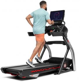 Person running on black Bowflex T22 Treadmill
