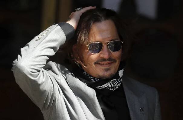 Johnny Depp po soudu s anglickým deníkem, který ho označil za násilníka.
