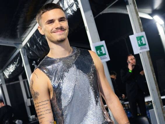 Romeo Beckham Makes A Surprise Appearance On The Versace AW25 Catwalk In Silver Chainmail