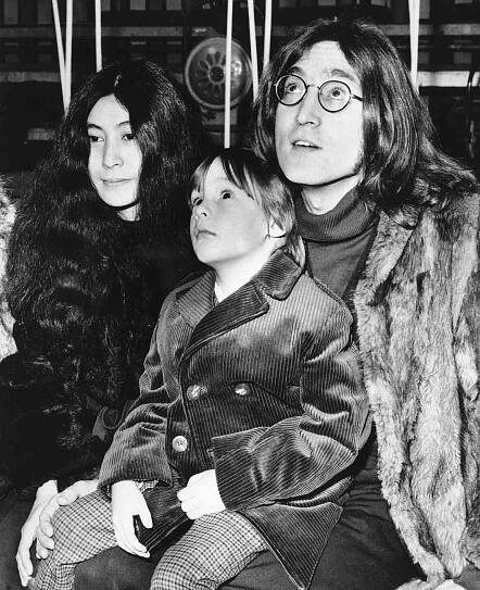 John Lennon, a member of the Beatles, was entertained by another singing group 12/10 when he took his five-year-son, Julian, to the rehearsals of the 