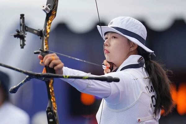 South Korea’s Lim Si-hyeon competes in archery on July 25.  She shot a world and Olympic record 694  in the individual ranking round.