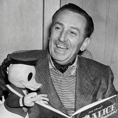 Walt Disney's 1950s living room is bathed in timeless, rich reds – 75 years later, we're still coveting...