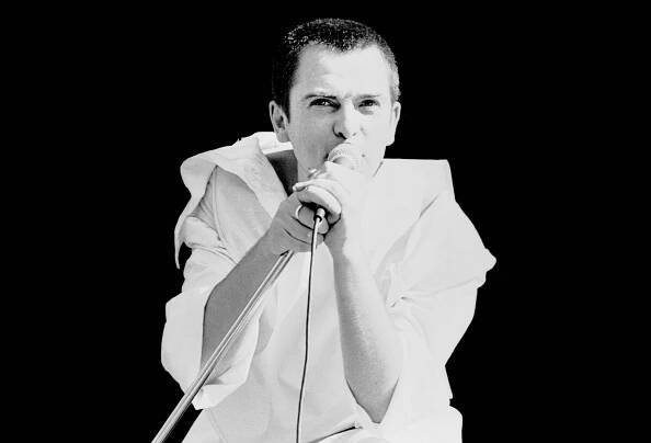Peter Gabriel performs on stage at Battersea Park, London, England, on September 16th 1978. He was performing at The Stranglers' 'Power in the Park' mini festival. (Photo by Gus Stewart/Redferns)