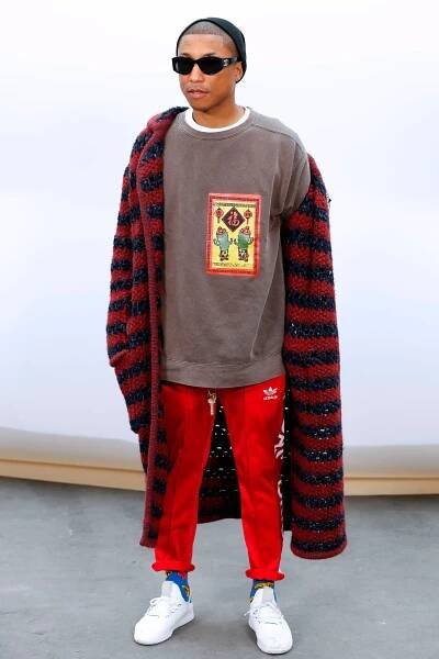 Image may contain Clothing Sleeve Apparel Long Sleeve Footwear Shoe Sunglasses Accessories and Accessory