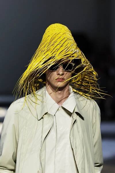 Image may contain Adult Person Clothing Coat Blonde Hair Accessories Glasses Face Head Photography and Portrait