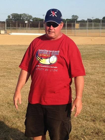 picture of John Crawford in a Renegades hat, sunglasses and an NBBA World Series shirt addresses the team