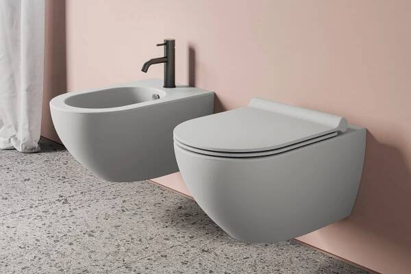 Závěsné wc a bidet Catalano Colori v barvě matný cement.
