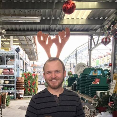 Alex Williams with reindeer antlers