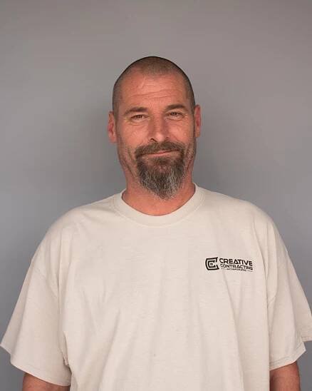  Brian McGuire , Carpenter
