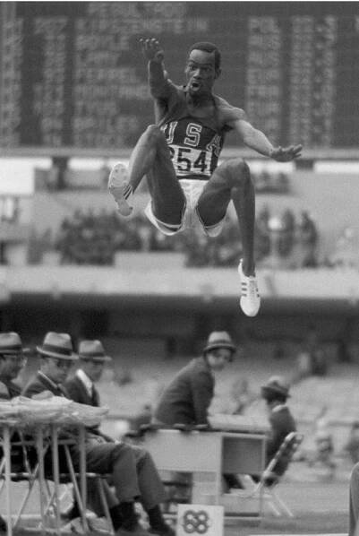 Bob Beamon of the United States leaps 8.90m to win gold