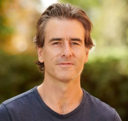 Head-and-shoulders photo of David Walker in blue T-shirt