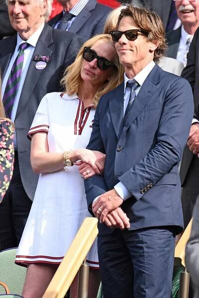Julia Roberts and Daniel Moder court-side of Centre Court during the men's final on day fourteen of the Wimbledon Tennis Championships at the All England Lawn Tennis and Croquet Club on July 14, 2024 in London, England.