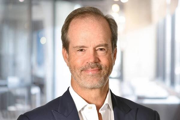 Headshot of John McCallum