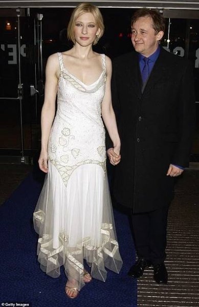 After the whirlwind proposal, the couple (pictured in 2004) tied the knot in a romantic ceremony in December 1997
