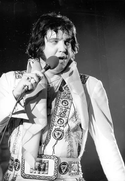 Elvis Presley circa 1977 performing.