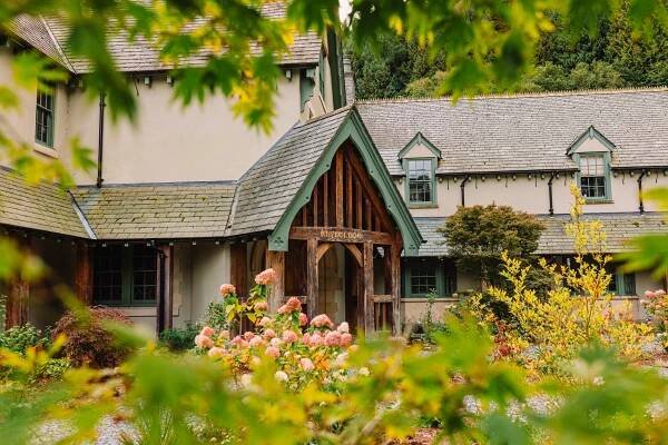 a house with a sign that says " welcome " on it