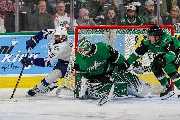 Canucks Fend Off Stars’ Comeback in Double Overtime