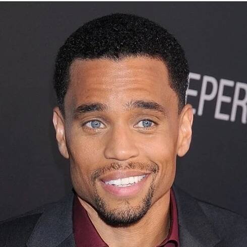 Upclose photo of Michael Ealy, one of the few black men with blue eyes