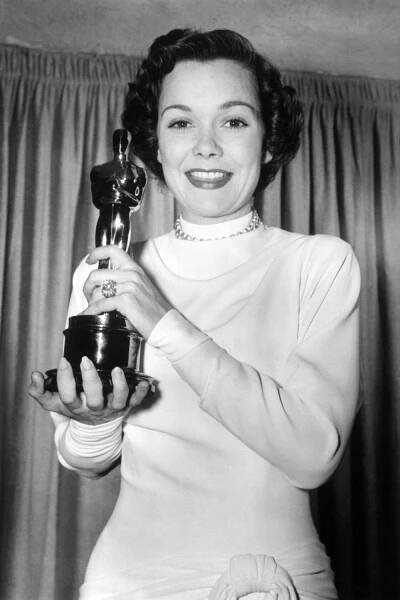 Jane Wyman poses with her Best Actress Oscar for 'Johnny Belinda' during the 21st annual Academy Awards held at the Academy Theater in Hollywood, Calif., on March 24, 1949
