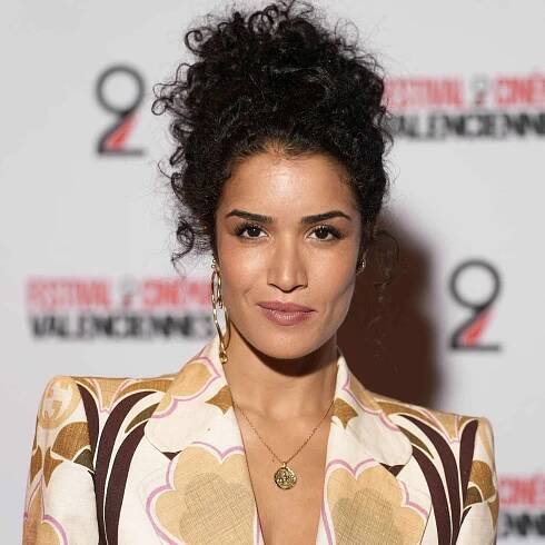Sabrina Ouazani with a messy updo, a French hairstyle