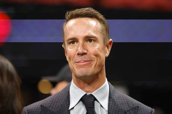 ATLANTA, GEORGIA - OCTOBER 03: Former quarterback Matt Ryan smiles prior to the game between the Tampa Bay Buccaneers and the Atlanta Falcons at Mercedes-Benz Stadium on October 03, 2024 in Atlanta, Georgia.