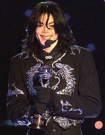 Michael Jackson holds the Millennium Award at a ceremony in May 2000 in Monaco.
