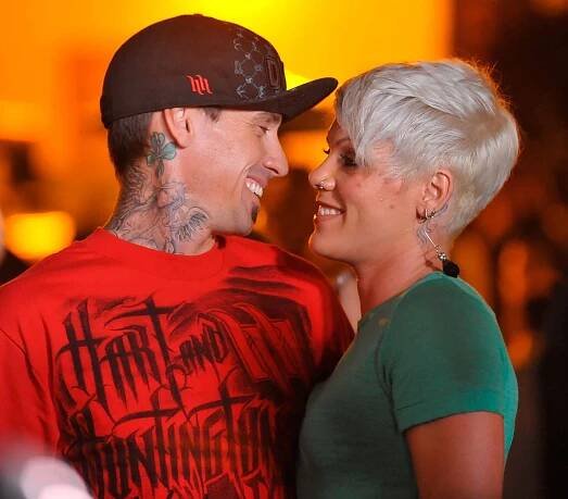 Carey Hart (L) and singer Pink arrive at the T-Mobile Sidekick LX launch event at Paramount Studios on May 14, 2009 in Hollywood, California