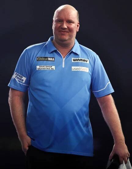 Vincent van der Voort smiling after a darts match.