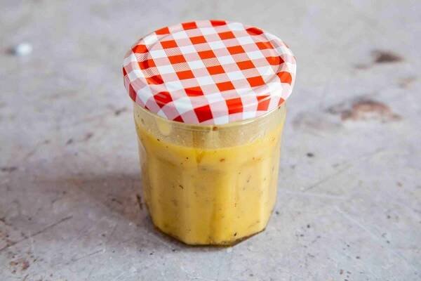the dressing has been shaken to make an emulsified yellow dressing