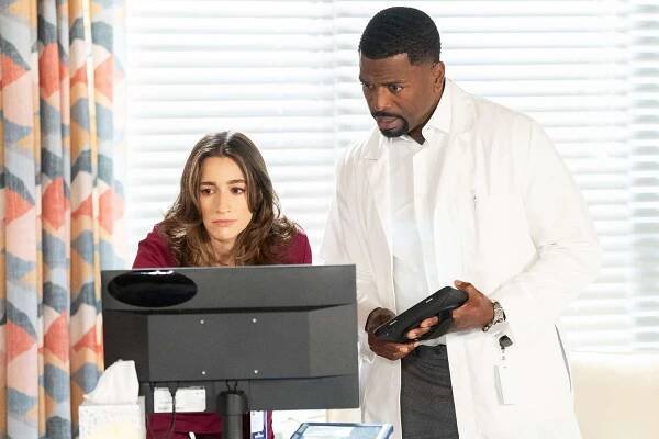 Jen Jacob as Ashley Morgan and Maurice Johnson as Ted Richardson in BEYOND THE GATES