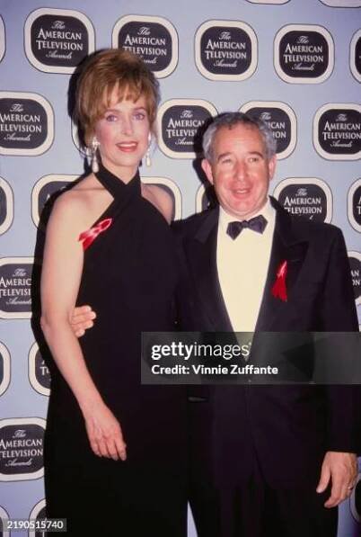 American actress Jill Eikenberry, wearing a sleeveless black halterneck evening gown, and her husband, American actor Michael Tucker, who wears a...