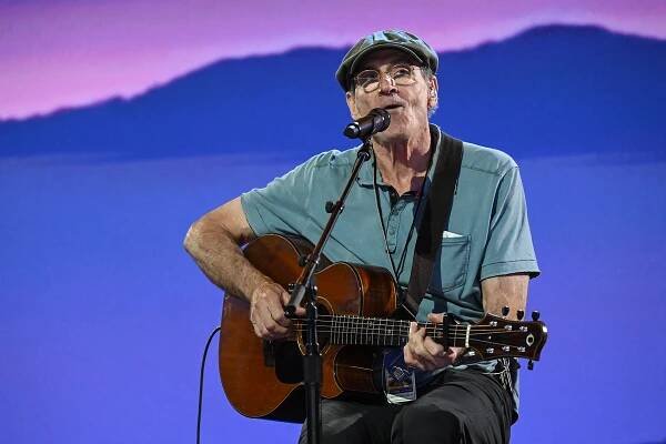 US musician James Taylor performs a sound check on the first day of the Democratic National Convention (DNC) at the United Center in Chicago, Illinois, on August 19, 2024. Vice President Kamala Harris will formally accept the party's nomination for president at the DNC which runs from August 19-22 in Chicago. (Photo by ANDREW CABALLERO-REYNOLDS / AFP) (Photo by ANDREW CABALLERO-REYNOLDS/AFP via Getty Images)